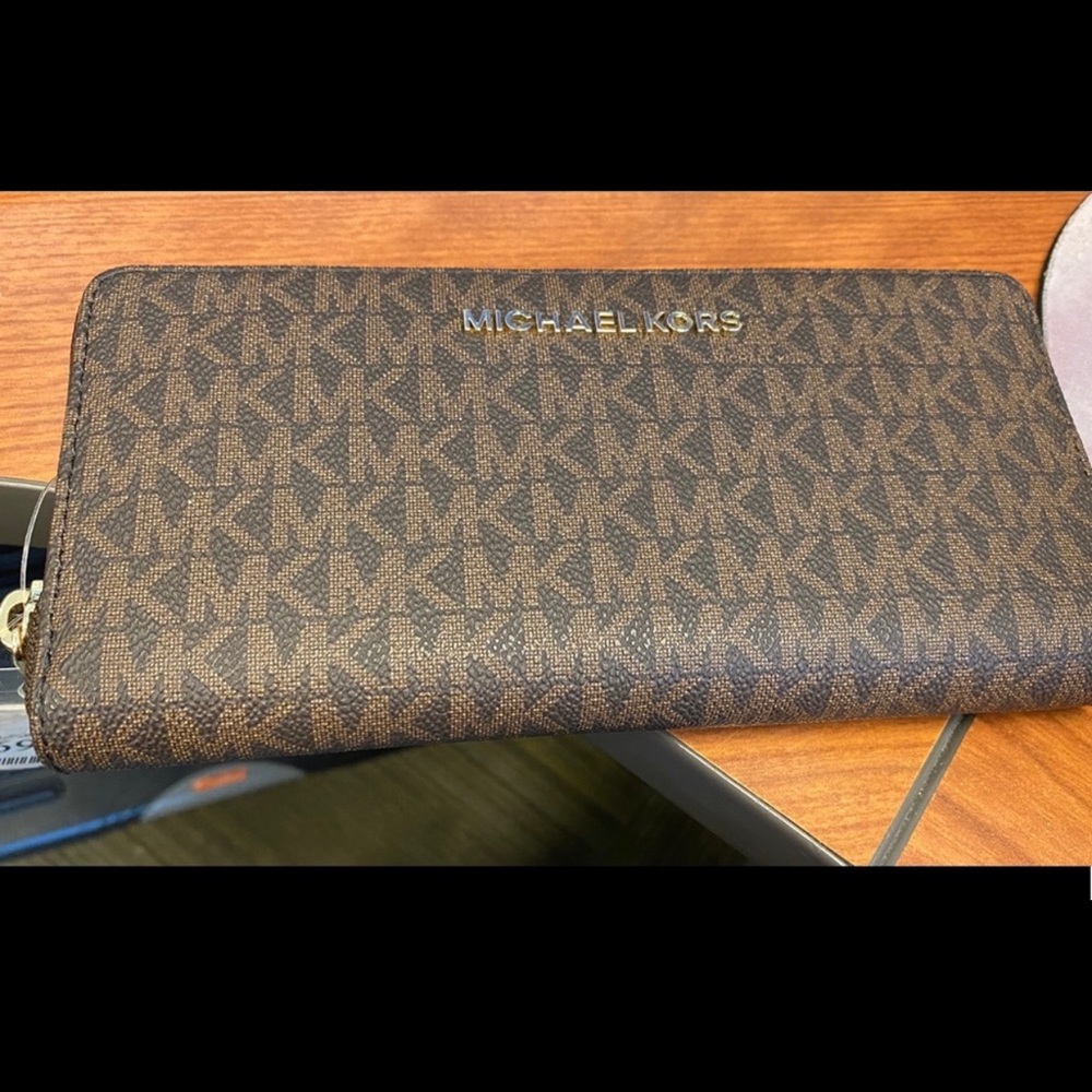 MK zippered wallet . New with tags
